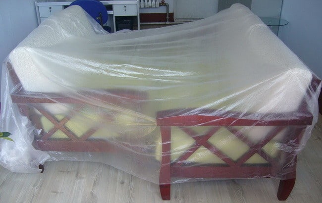 put plastic drop sheeting over furniture