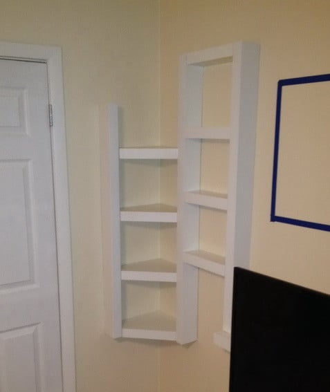 Here are the DIY corner shelf unit completely finished and painted 