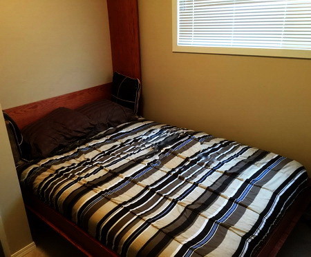  Add sheets, comforter, pillows and your DIY Murphy bed is COMPLETE