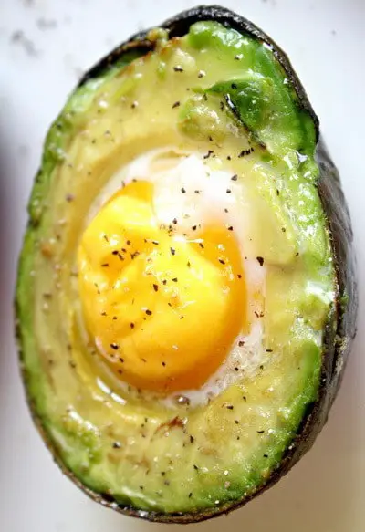 fried egg on top of avocado