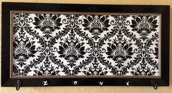 coat hanger $5 frame 96 cent knobs hooks paint and $2 demask fabric