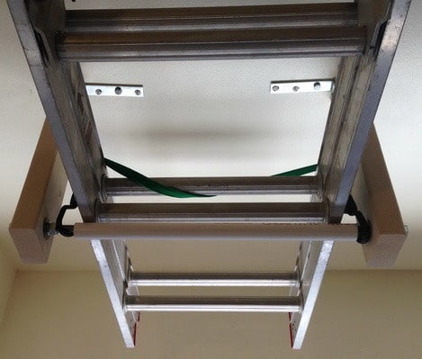 How To Store A Ladder On The Garage Ceiling Like A Pro