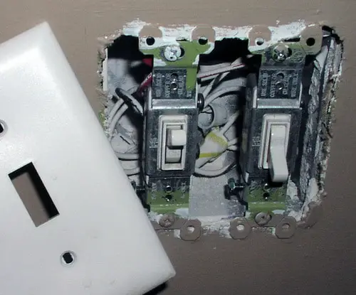 Remove light switch cover and check wiring