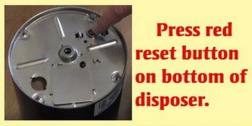 Press button to reset garbage disposal