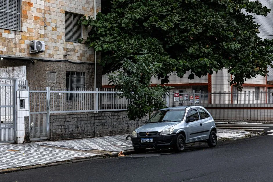 Car parked on a quiet residential street where you can safely recharge the AC